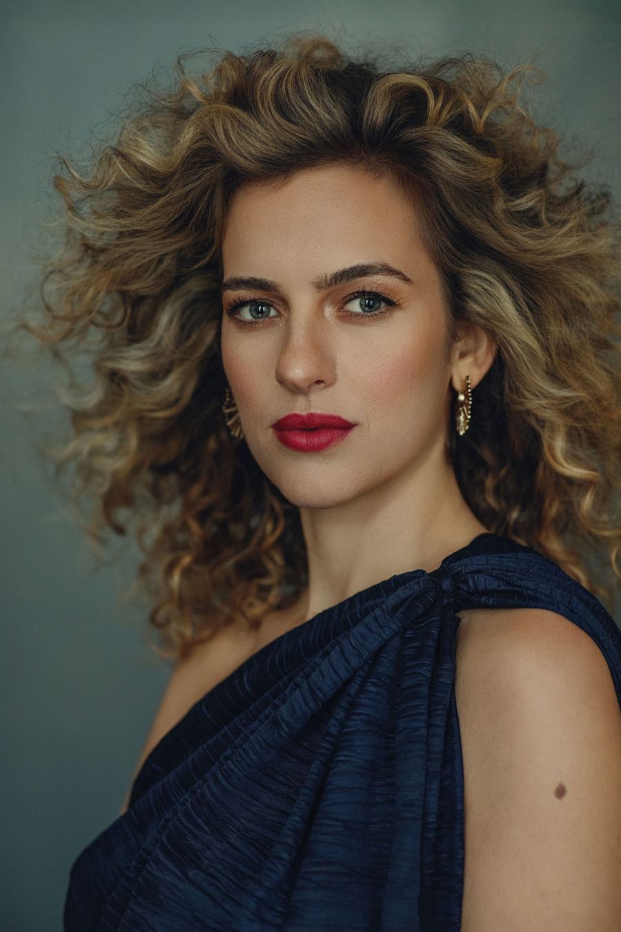 Curls and red lip portrait — hair and makeup by Kim Steele